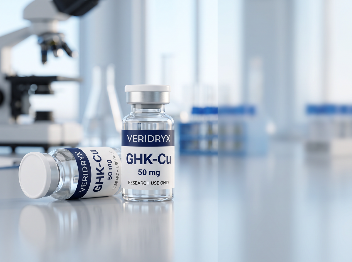 Two Veridryx GHK-Cu 50 mg research vials on a laboratory bench